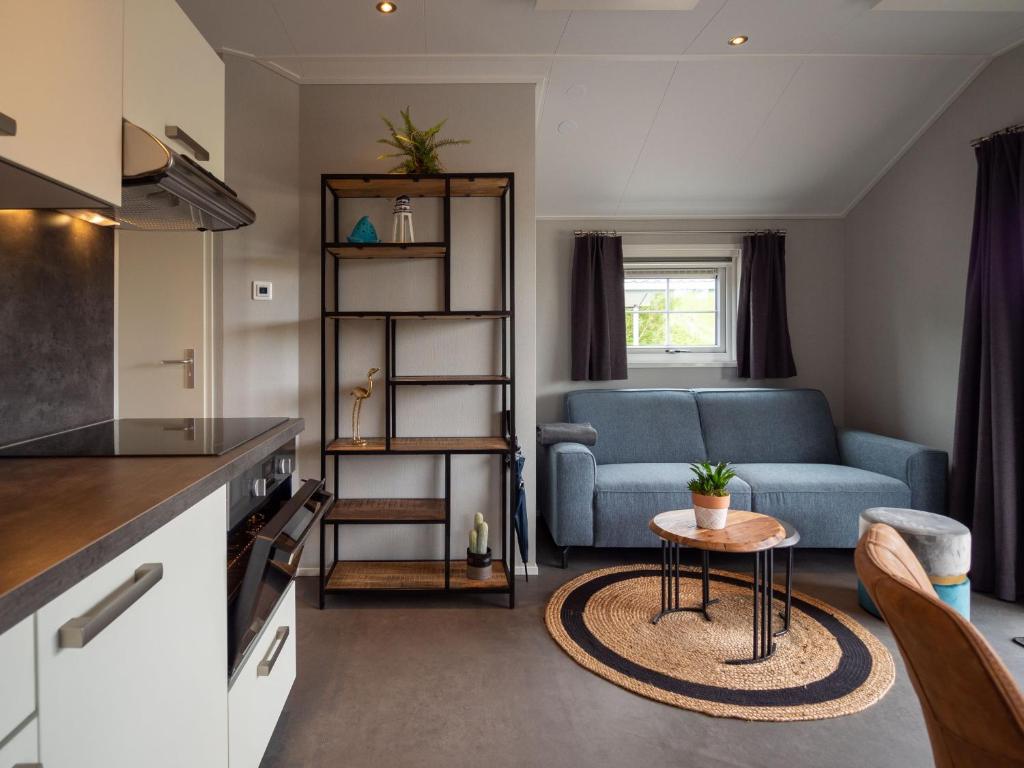 Kuchyň nebo kuchyňský kout v ubytování Luxe Lodge Zeehoeve
