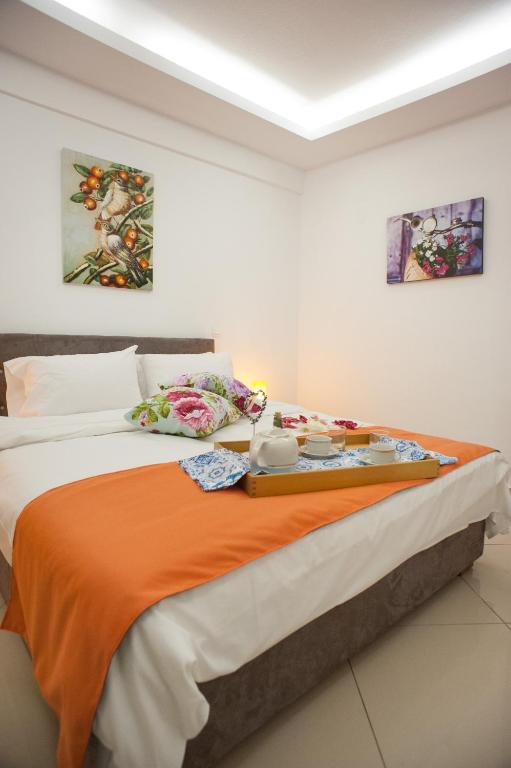 A bed or beds in a room at DREAM APPARTMENT 3 PEREA