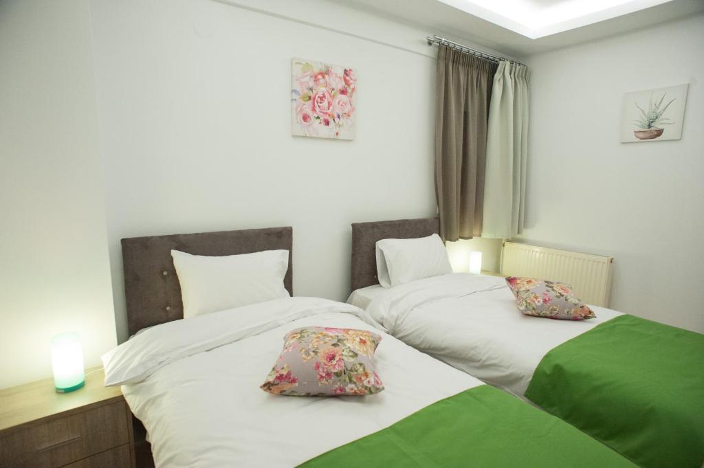 A bed or beds in a room at DREAM APPARTMENT 3 PEREA