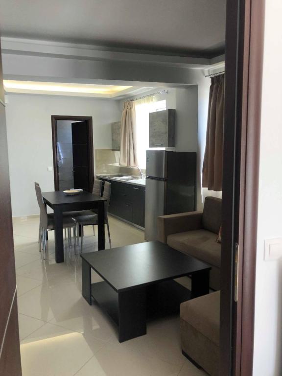 A television and/or entertainment centre at DREAM APPARTMENT 3 PEREA