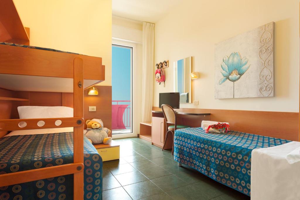 Postel nebo postele na pokoji v ubytování Hotel Atlantic Vista Mare