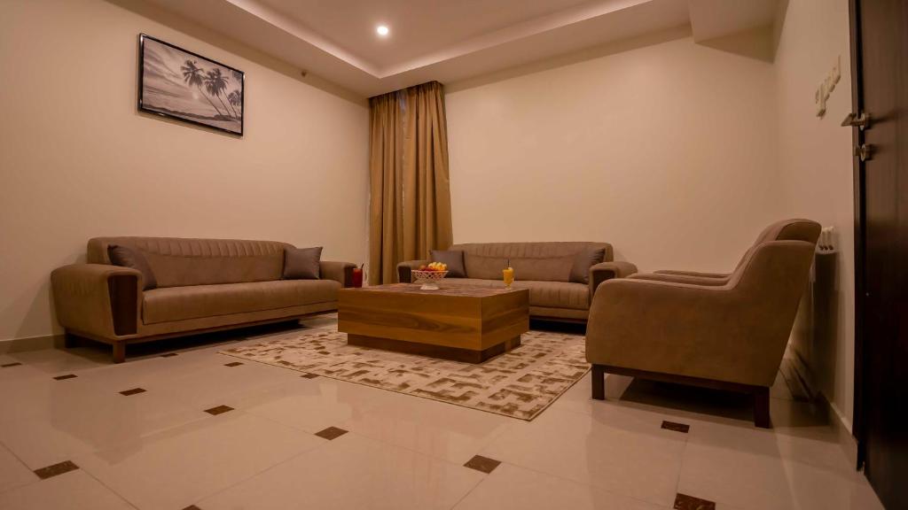 Posezení v ubytování Nukhbat Al Makan Apartment Hotel