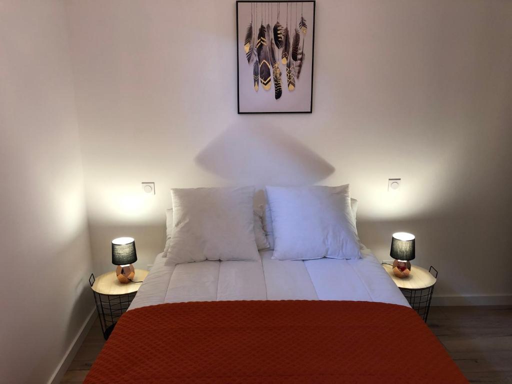 Postel nebo postele na pokoji v ubytování Maison Simonenia