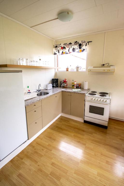 Kuchyň nebo kuchyňský kout v ubytování Saurbær Apartment