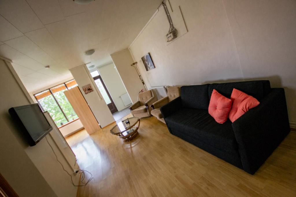 TV a/nebo společenská místnost v ubytování Saurbær Apartment
