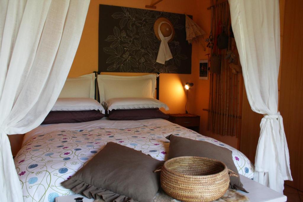 Postel nebo postele na pokoji v ubytování Mini suite alla Cascata