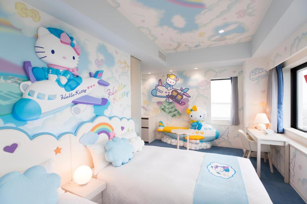a childs room with a hello kitty themed bedroom at Centrair Hotel in Tokoname