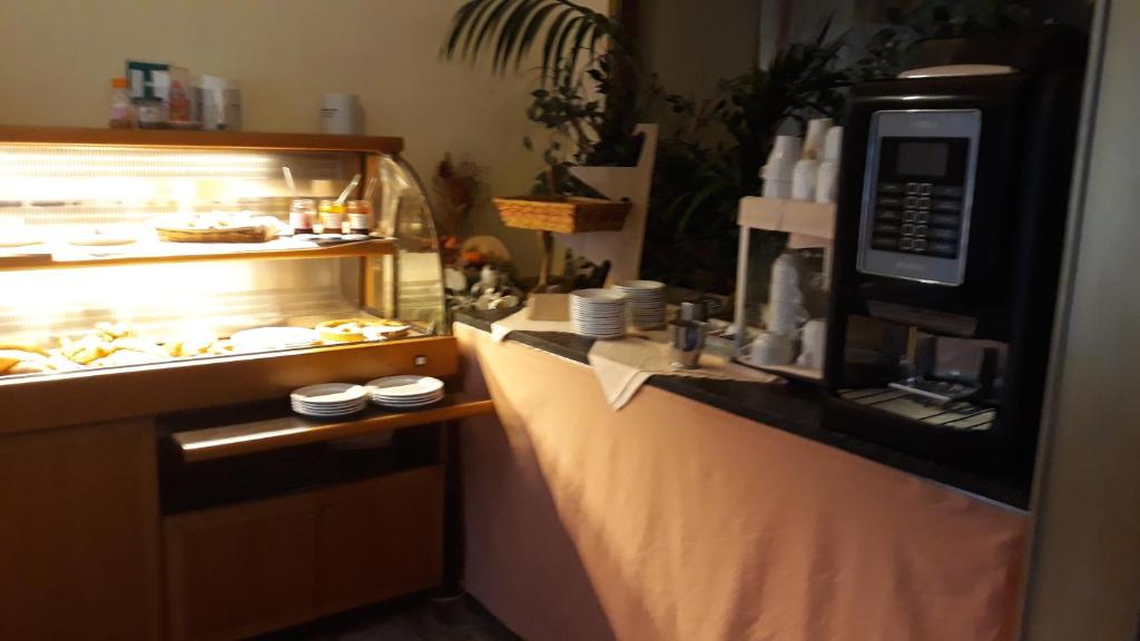 Kuchyň nebo kuchyňský kout v ubytování Hotel San Marino