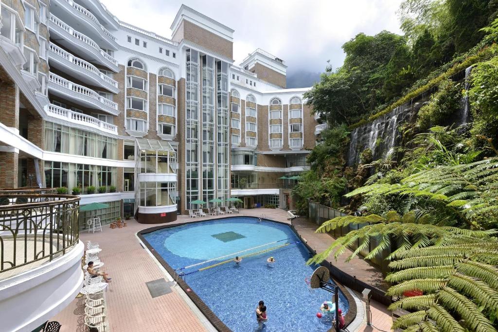 Bazén v ubytování Le Midi Hotel Chitou nebo v jeho okolí