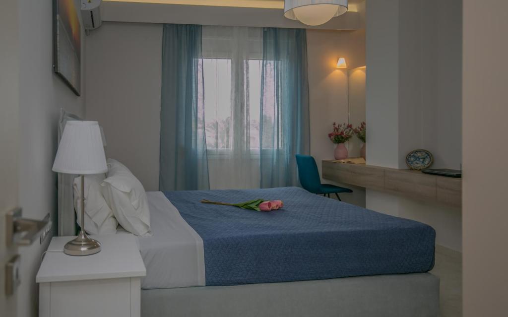 Posteľ alebo postele v izbe v ubytovaní Evgenia Apartment