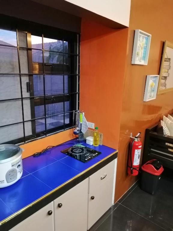 Kuchyň nebo kuchyňský kout v ubytování Blue Residence Tagaytay