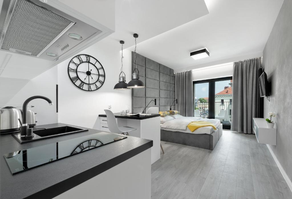 Posteľ alebo postele v izbe v ubytovaní Native Apartments Rajska 3