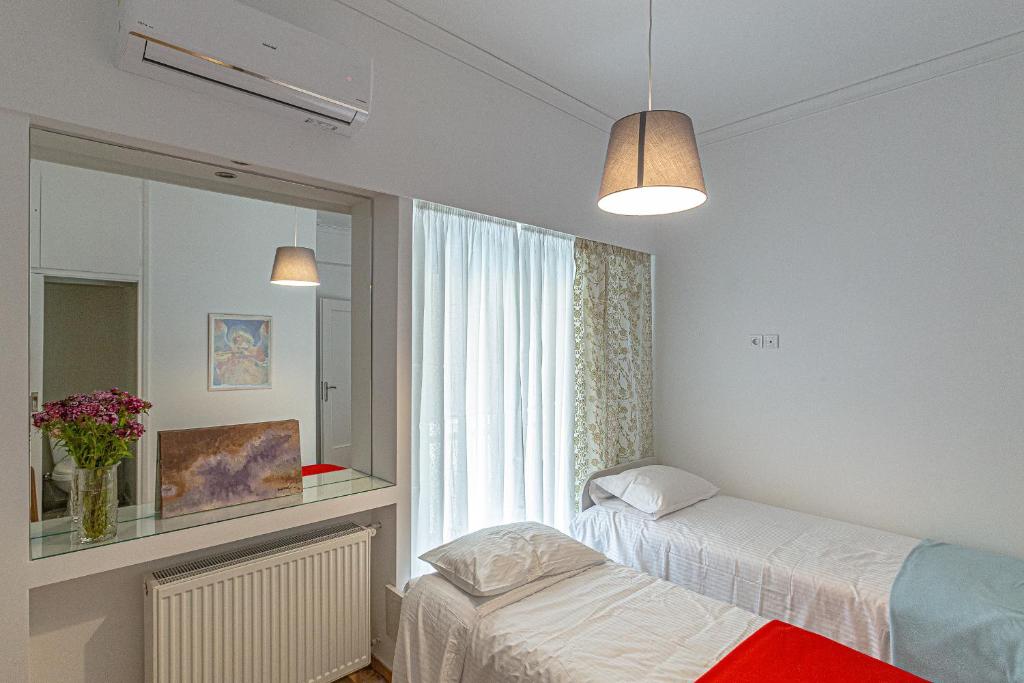 Postel nebo postele na pokoji v ubytování Marveco Apartment