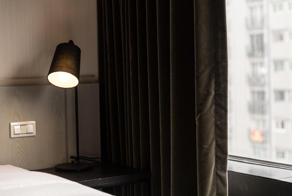 Postel nebo postele na pokoji v ubytování Vendome East Inn