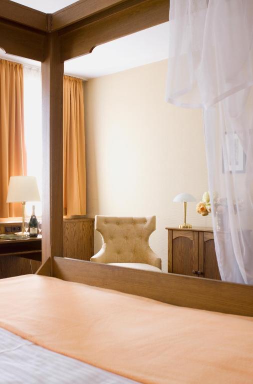 Postel nebo postele na pokoji v ubytování Hotel Lindenwirt