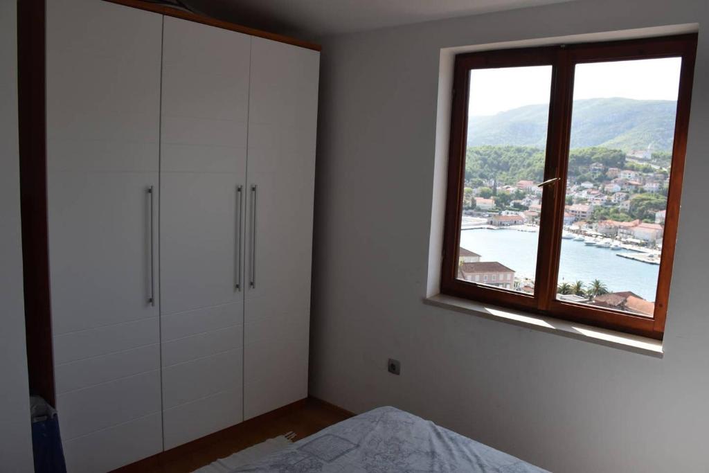 Posteľ alebo postele v izbe v ubytovaní BellaVista Jelsa 2+2