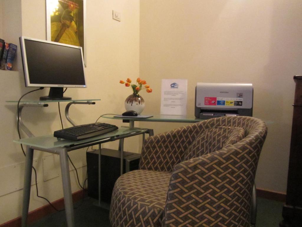TV a/nebo společenská místnost v ubytování Hotel Roma