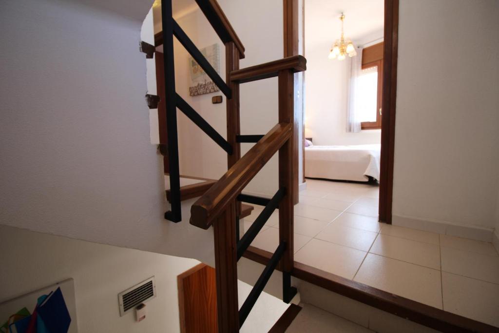 Posteľ alebo postele v izbe v ubytovaní Apart-rent Casa con piscina Sant Maurici 0191
