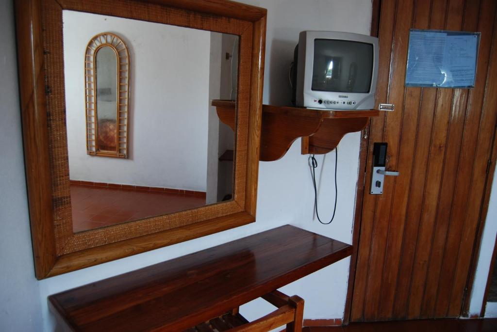 TV a/nebo společenská místnost v ubytování Hotel Alux Cancun