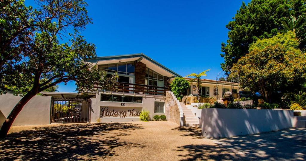 a house with a staircase in front of it at Ladera - Vista Self-catering Guesthouse in Paarl