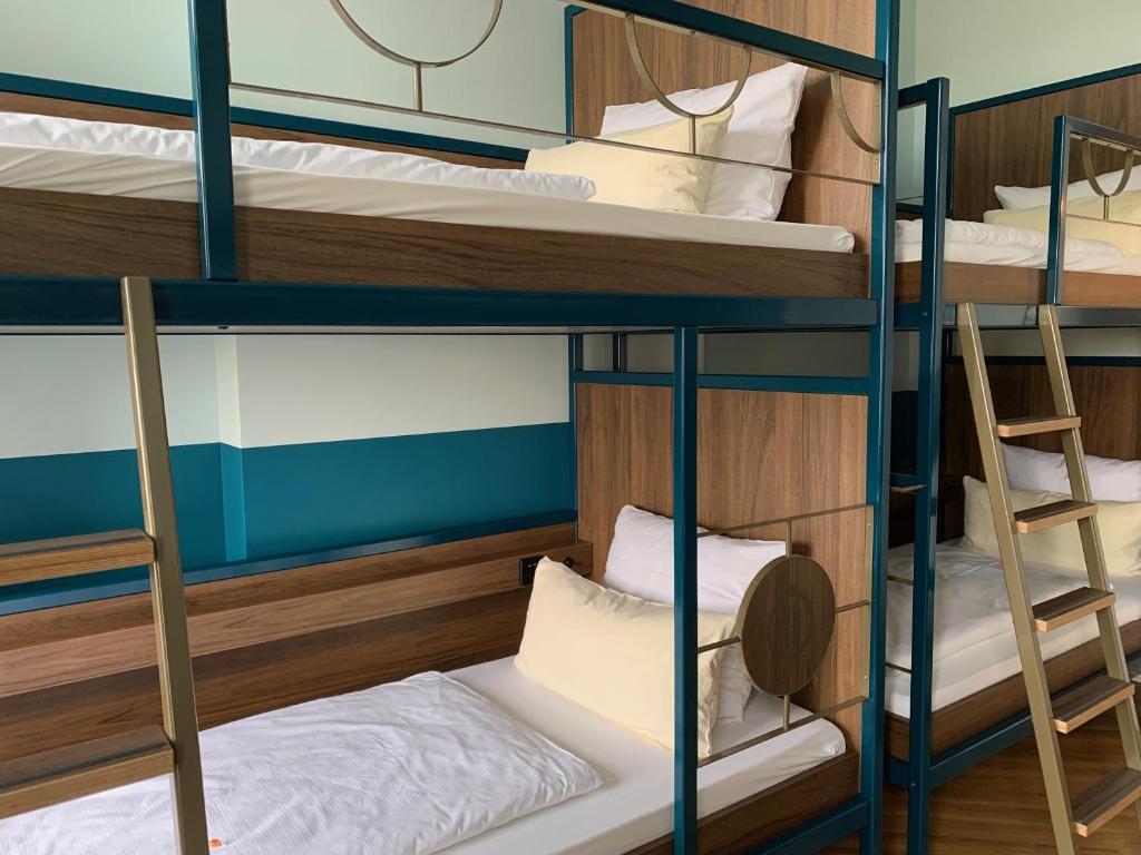 Postel nebo postele na pokoji v ubytování Grand Hostel Berlin Classic