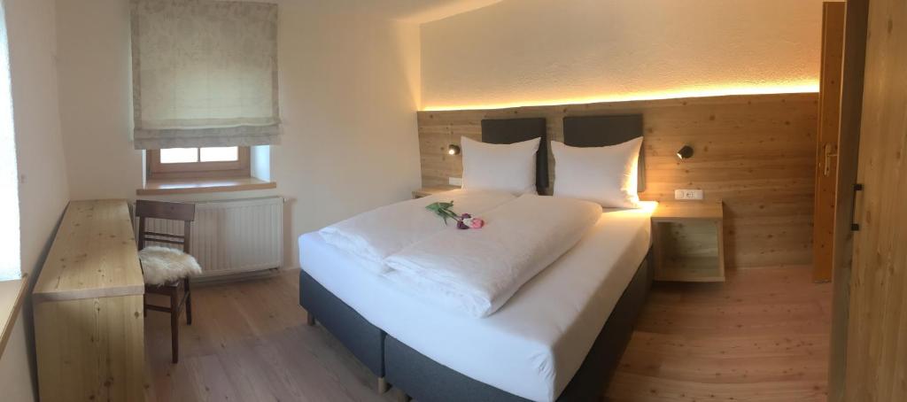 Posteľ alebo postele v izbe v ubytovaní Apartment Der Riese