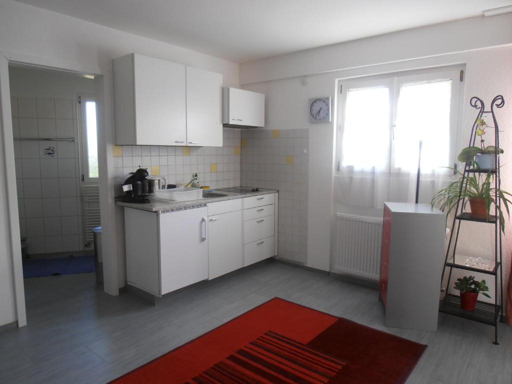 Una cocina o cocineta en Don Camillo Gästehaus