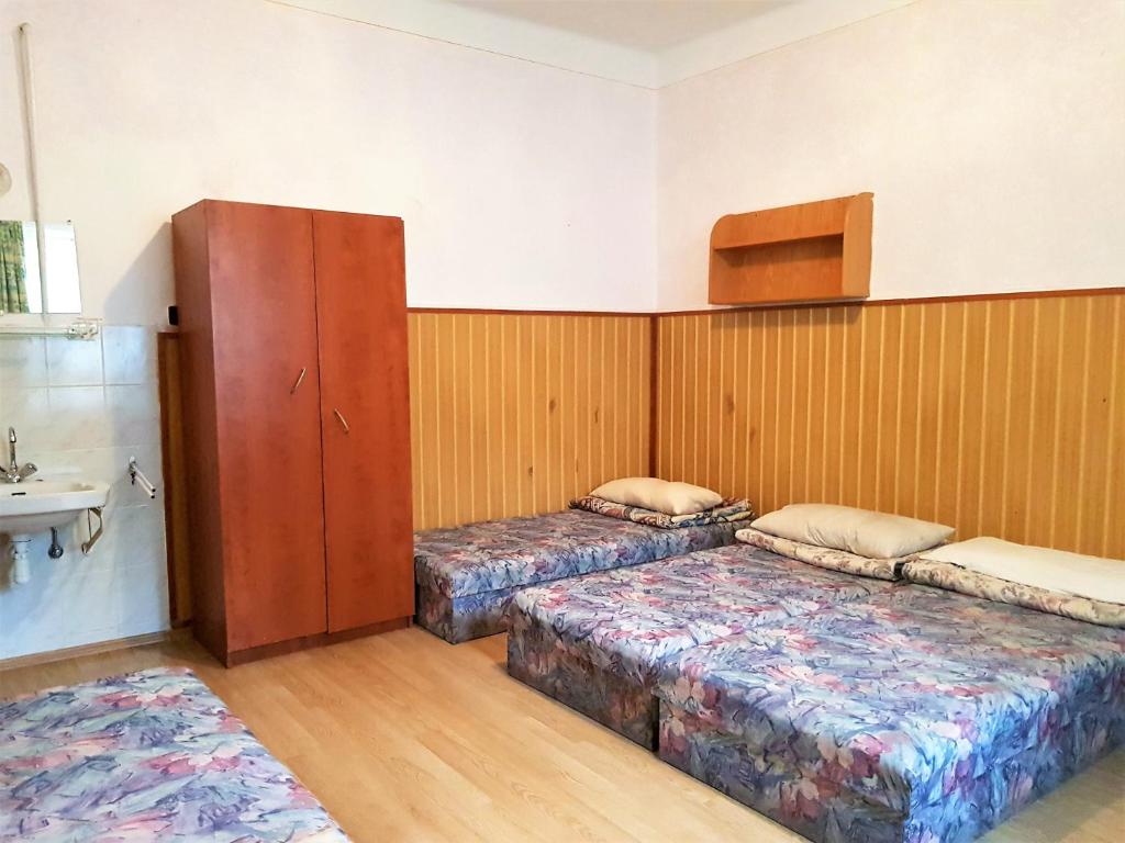 Postel nebo postele na pokoji v ubytování Muskátli Vendégház