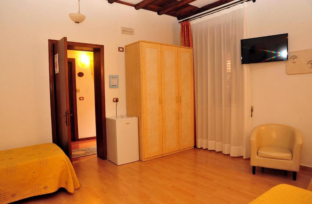Telewizja i/lub zestaw kina domowego w obiekcie B&B Viaprimaldo Camere