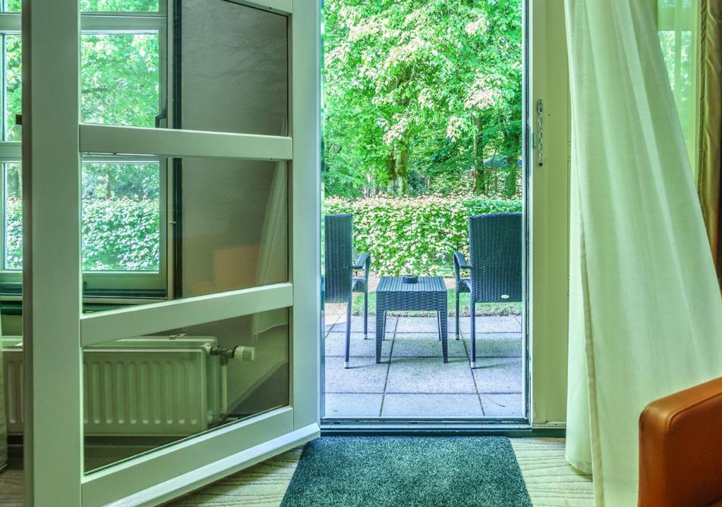 Posezení v ubytování Parkhotel Tjaarda