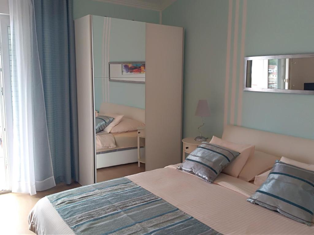 Postel nebo postele na pokoji v ubytování Apartments & Rooms Vitt