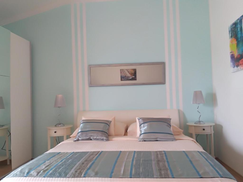 Postel nebo postele na pokoji v ubytování Apartments & Rooms Vitt
