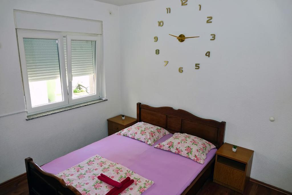 Postel nebo postele na pokoji v ubytování Lux Dalmatia I & R