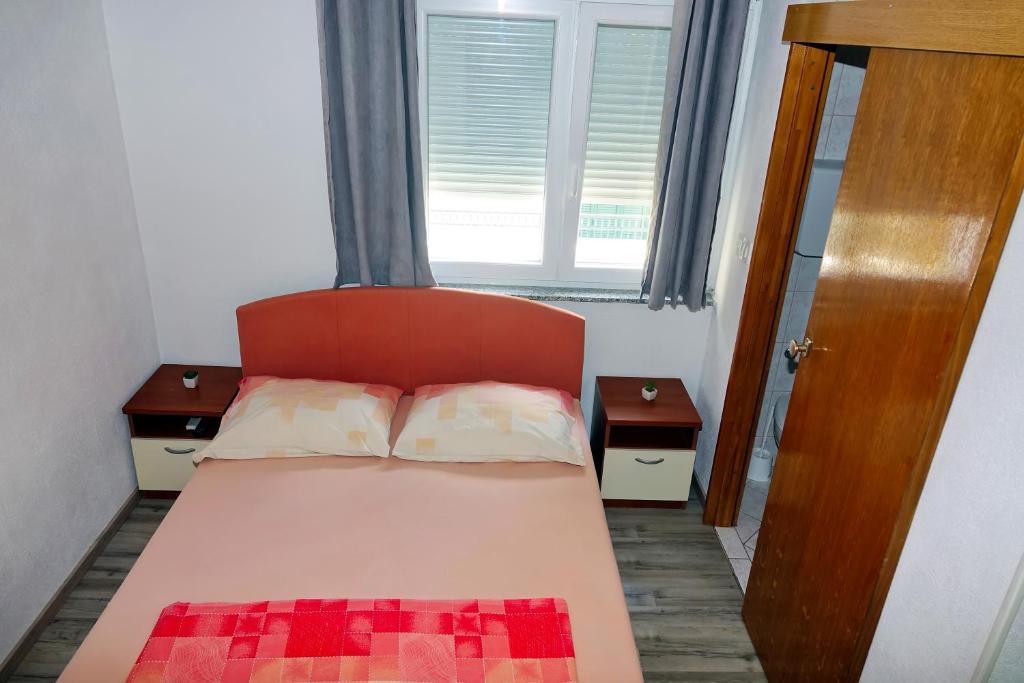 Postel nebo postele na pokoji v ubytování Lux Dalmatia I & R