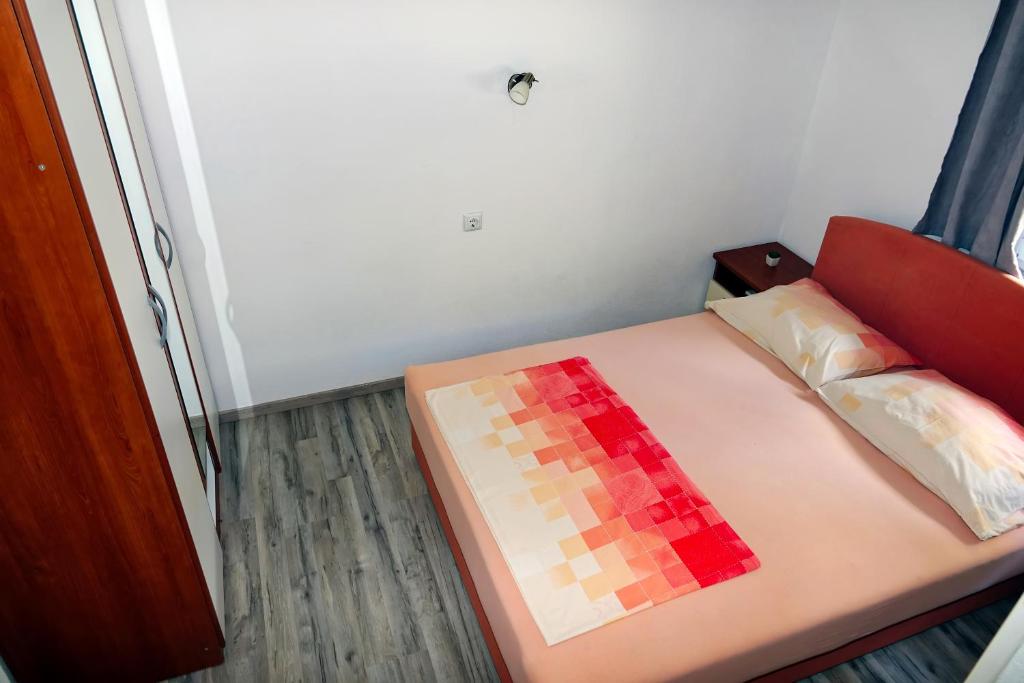 Postel nebo postele na pokoji v ubytování Lux Dalmatia I & R