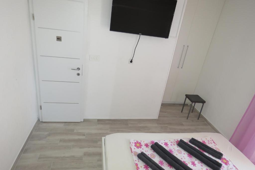 TV a/nebo společenská místnost v ubytování Lux Dalmatia I & R