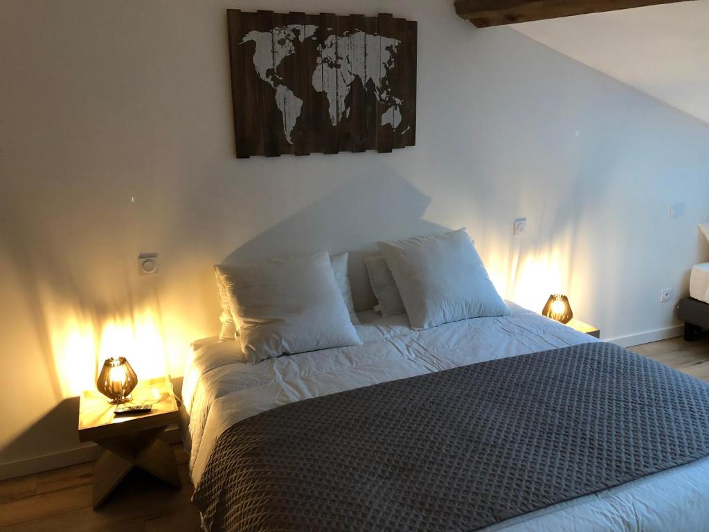 Postel nebo postele na pokoji v ubytování Maison Simonenia