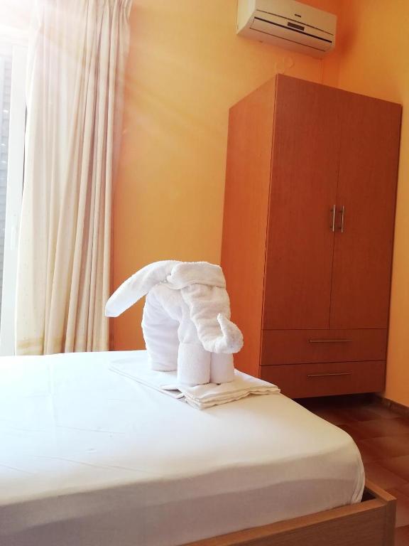 Posteľ alebo postele v izbe v ubytovaní Eleftheria's Apartments
