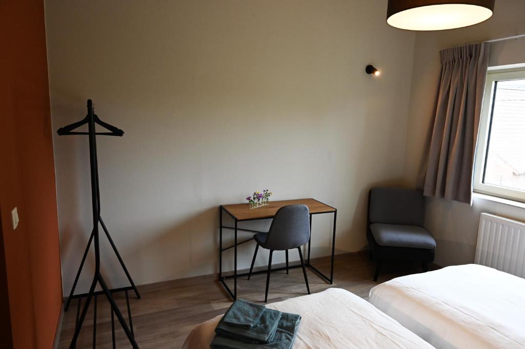 Postel nebo postele na pokoji v ubytování B&B Dujardin