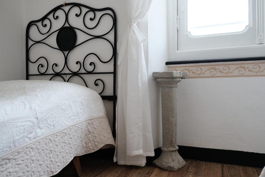 Postel nebo postele na pokoji v ubytování B&B Casa Del Priore