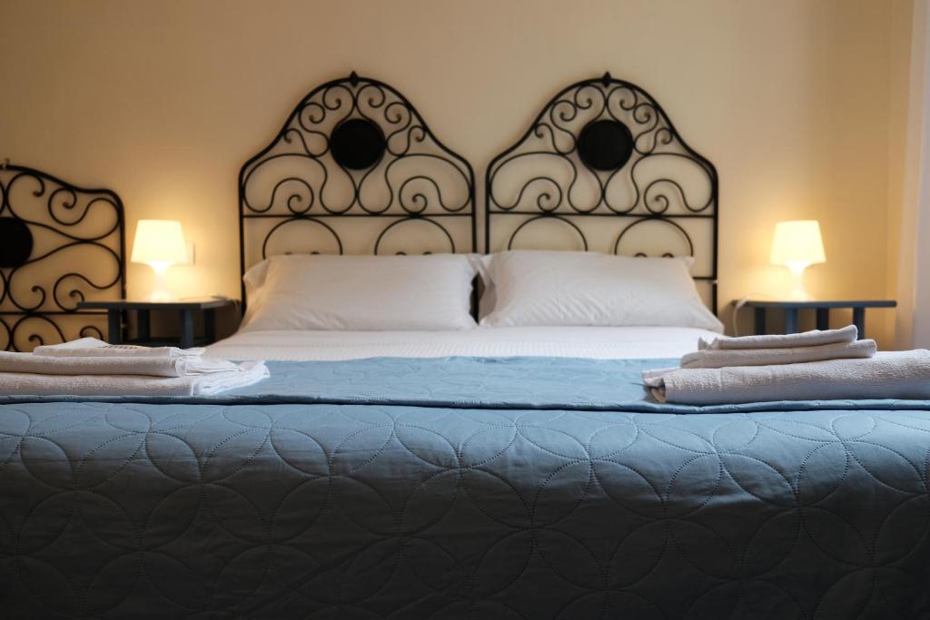 Postel nebo postele na pokoji v ubytování B&B Casa Del Priore