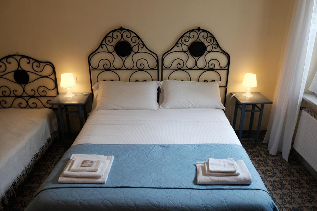 Postel nebo postele na pokoji v ubytování B&B Casa Del Priore