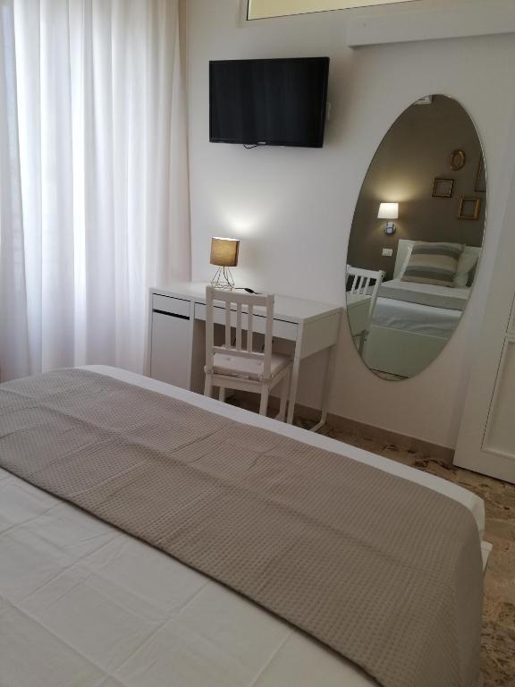 Postel nebo postele na pokoji v ubytování Ostuni Crispi House