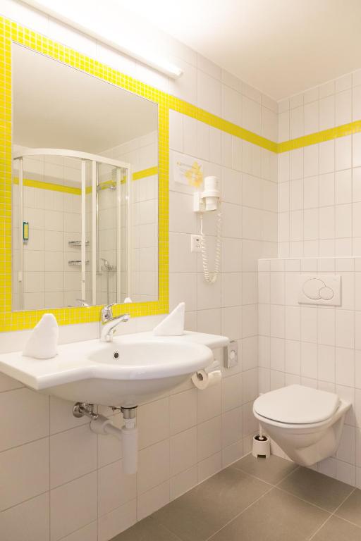 Koupelna v ubytování Hôtel Des Arts
