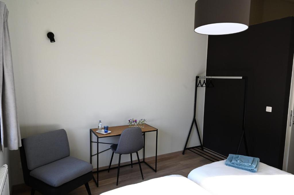Postel nebo postele na pokoji v ubytování B&B Dujardin