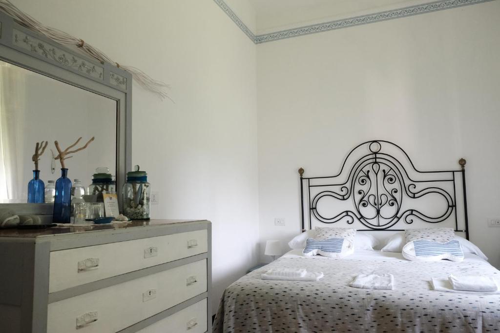 Postel nebo postele na pokoji v ubytování B&B Casa Del Priore
