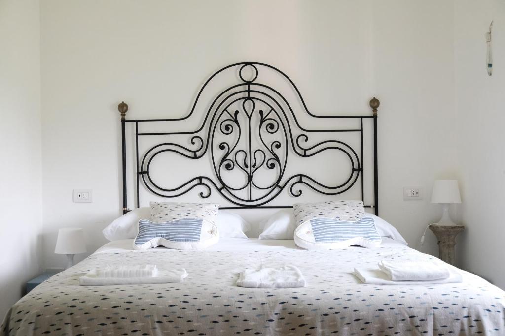 Postel nebo postele na pokoji v ubytování B&B Casa Del Priore