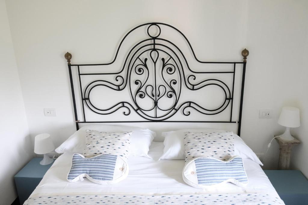 Postel nebo postele na pokoji v ubytování B&B Casa Del Priore
