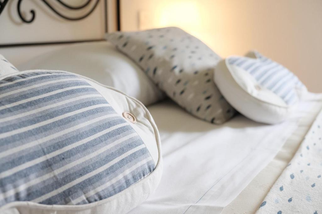Postel nebo postele na pokoji v ubytování B&B Casa Del Priore