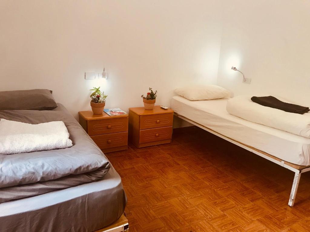 Voodi või voodid majutusasutuse Al Yakhour Hostel toas